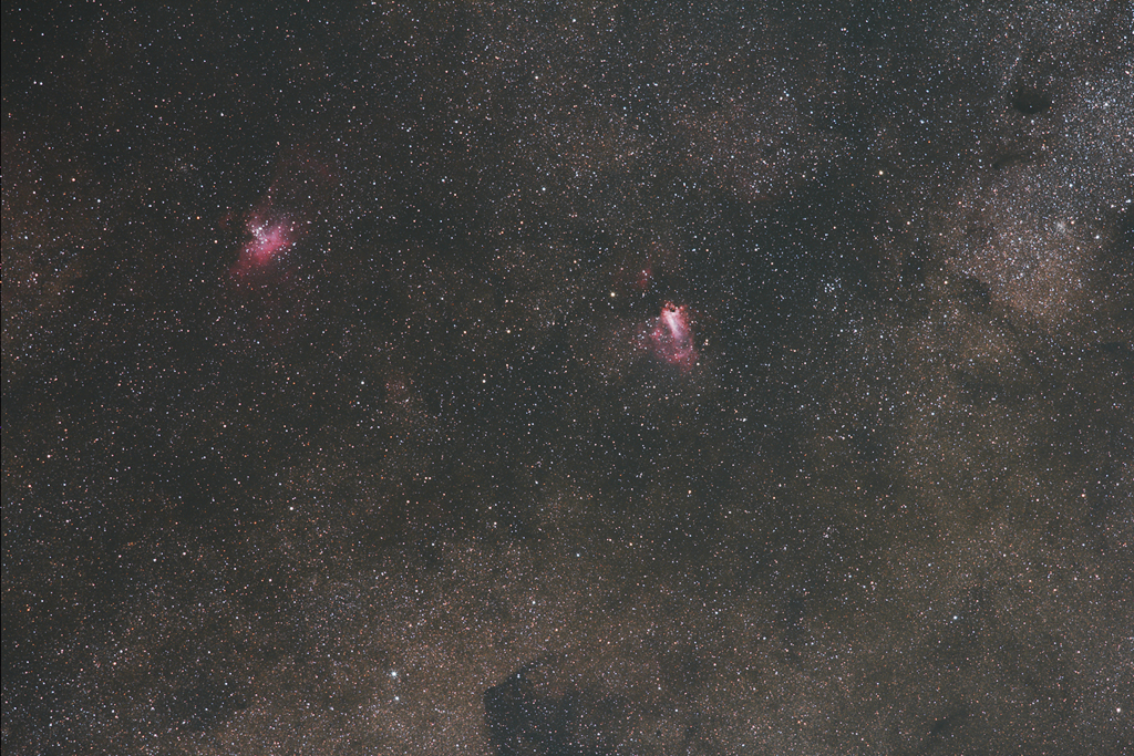 M16 (Eagle Nebula) and M17 (Swan or Omega Nebula) taken with a Canon EOS 60Da and 200mm lens. Click the image for a larger version.